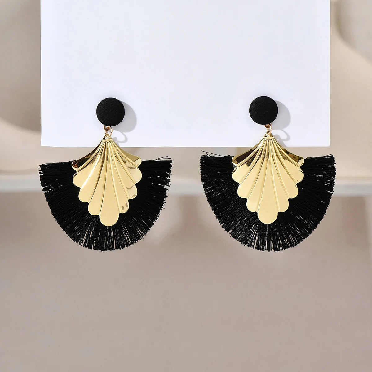 Bohemian fan shaped tassel earrings with fashionable ripple design and exaggerated style earrings