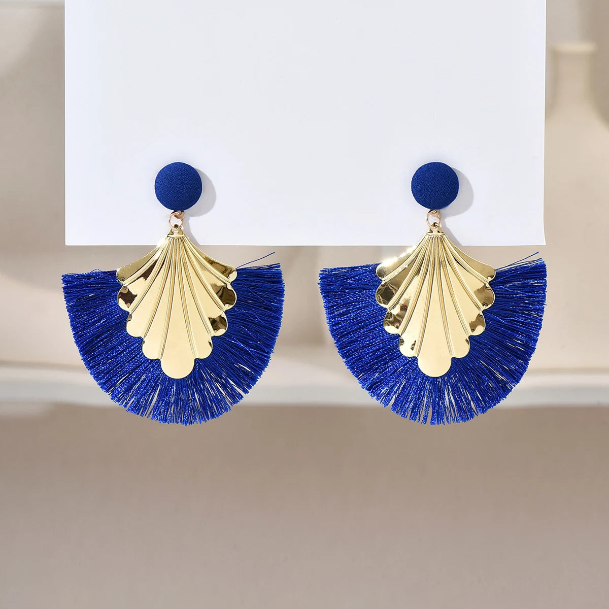 Bohemian fan shaped tassel earrings with fashionable ripple design and exaggerated style earrings