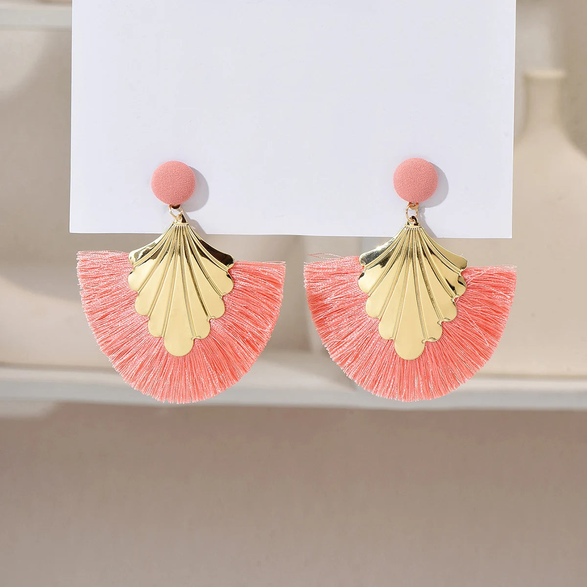 Bohemian fan shaped tassel earrings with fashionable ripple design and exaggerated style earrings