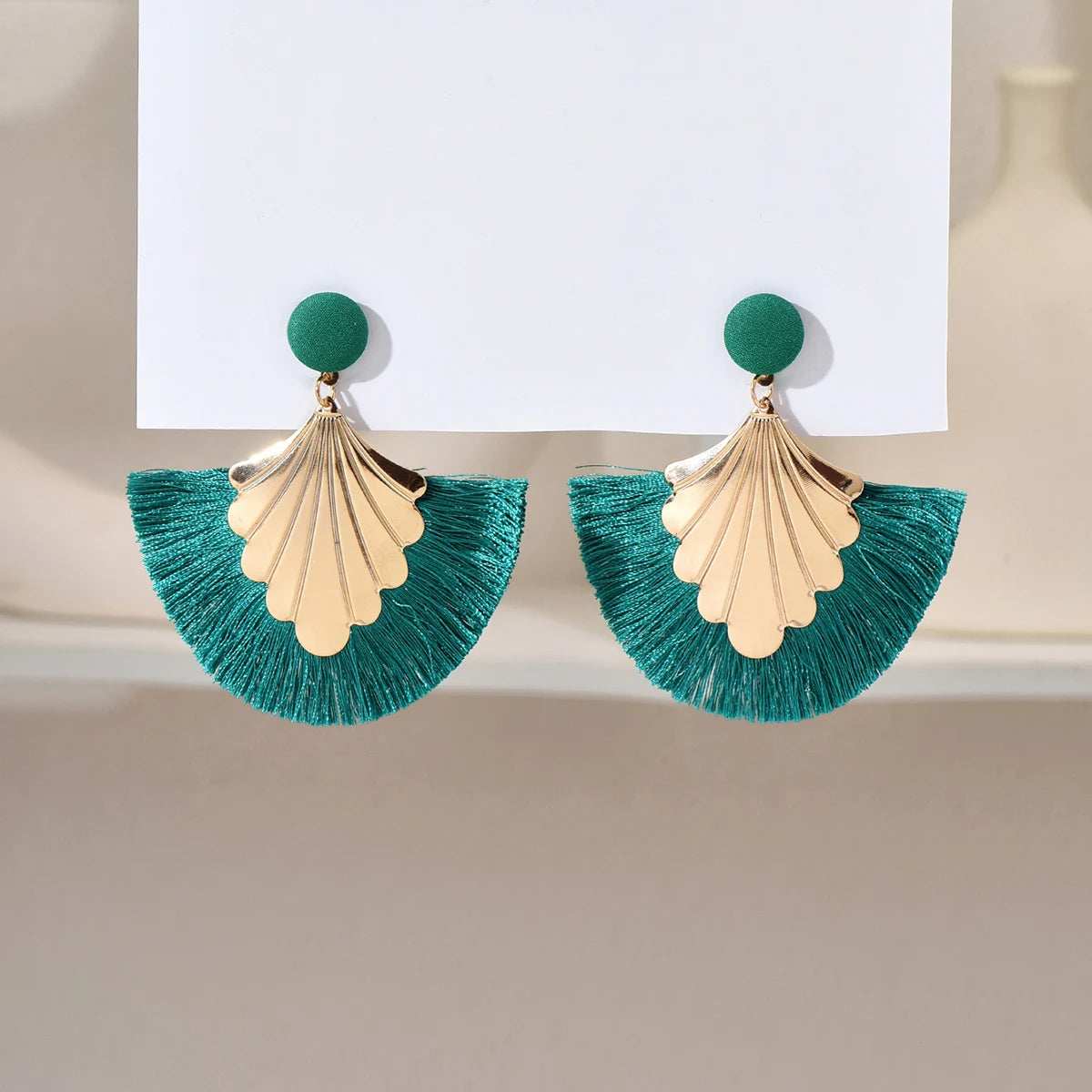 Bohemian fan shaped tassel earrings with fashionable ripple design and exaggerated style earrings