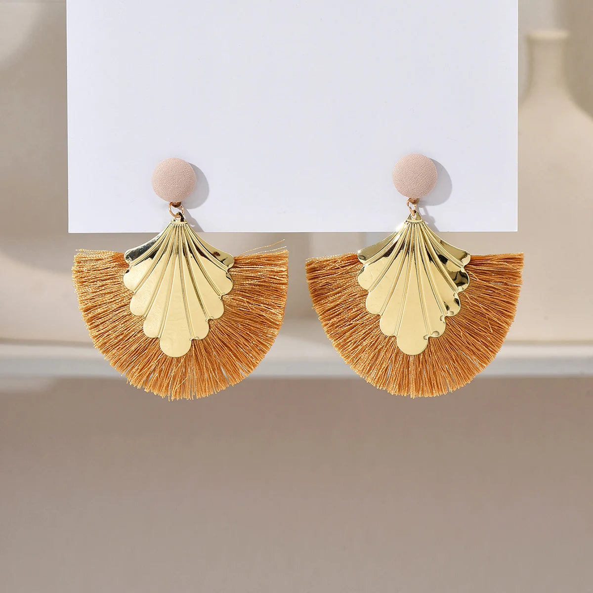 Bohemian fan shaped tassel earrings with fashionable ripple design and exaggerated style earrings
